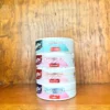 Kingston nicotine pouches in different nicotine strengths and a variety of flavours on wood background