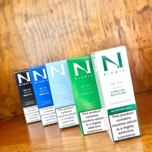 Nic nic flavourless nicotine shots in a 50VG, 70VG, 100VG, salt nicotine and ice in 10ml bottle on wood background