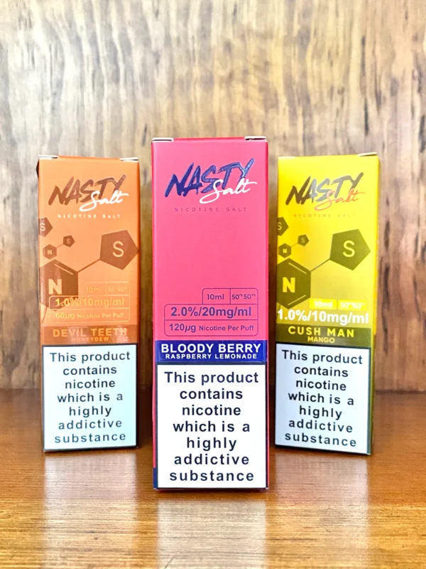 Nasty nicotine salts 10ml in 10mg and 20mg strengths and a variety of flavours on wood background