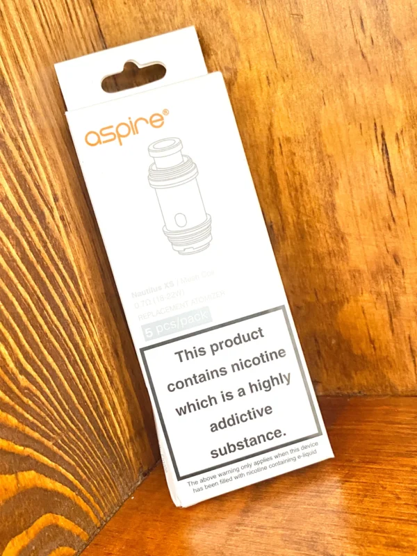Aspire-nautilus-XS-replacement-coils Aspire nautilus XS replacement coils 5 pack 0.7 ohms in white box on wood background