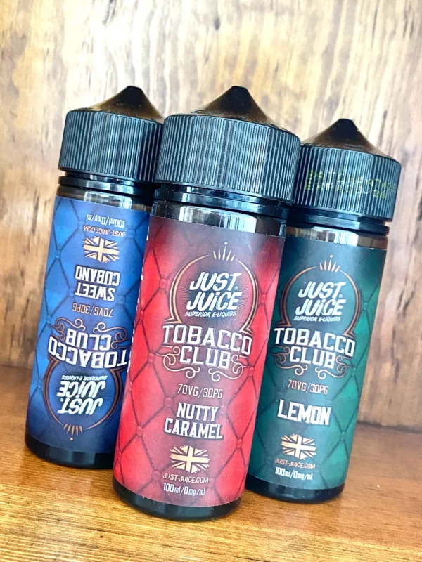 Just-juice-tobacco-club-100ml Just juice tobacco club 100ml in sweet Cubano, nutty caramel, lemon on wood background