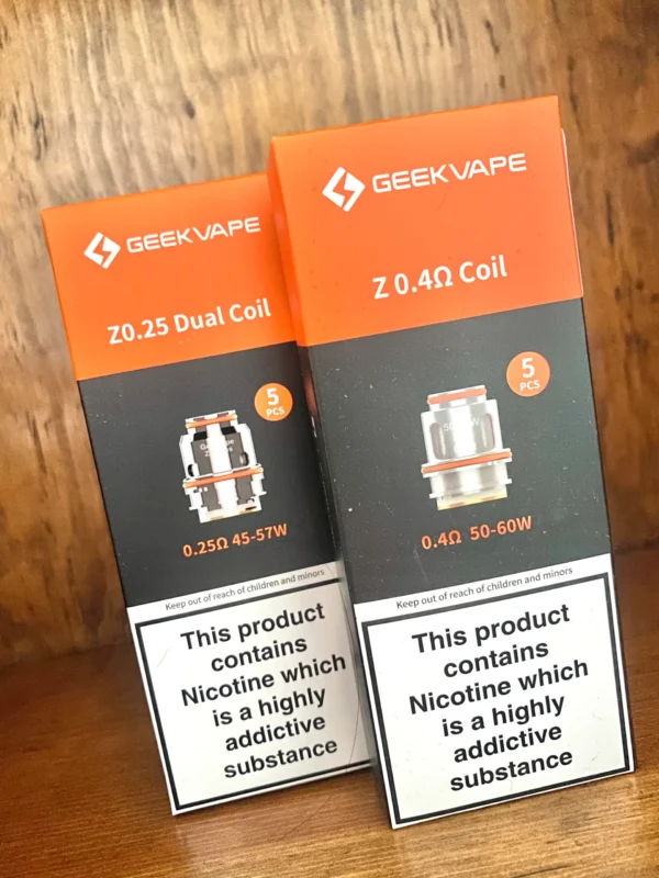 Geekvape Zeus replacement coils 5 pack in 0.25,0.4,0.2,0.15 ohms on wood background