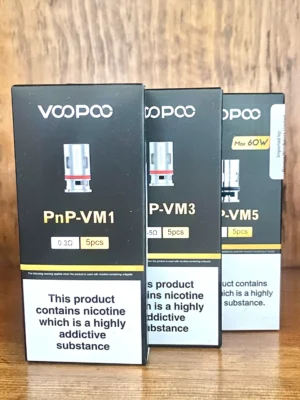 Voopoo pnp replacement coils 5 pack in vm1,vm3,vm4,vm5 on wood background