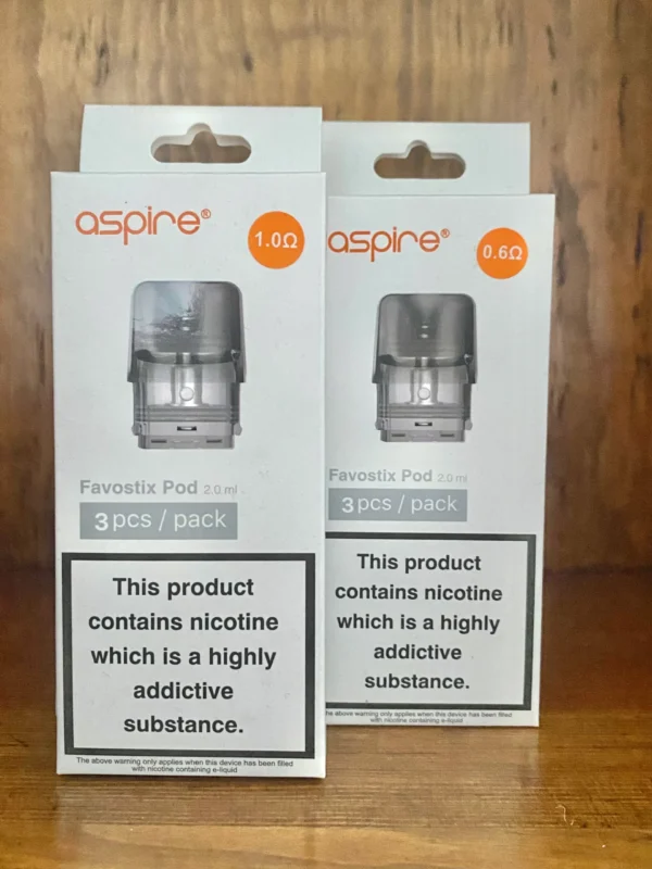 Aspire Favostix replacement pods 3 pack 2ml 0.6, 1.0 ohm on wood background