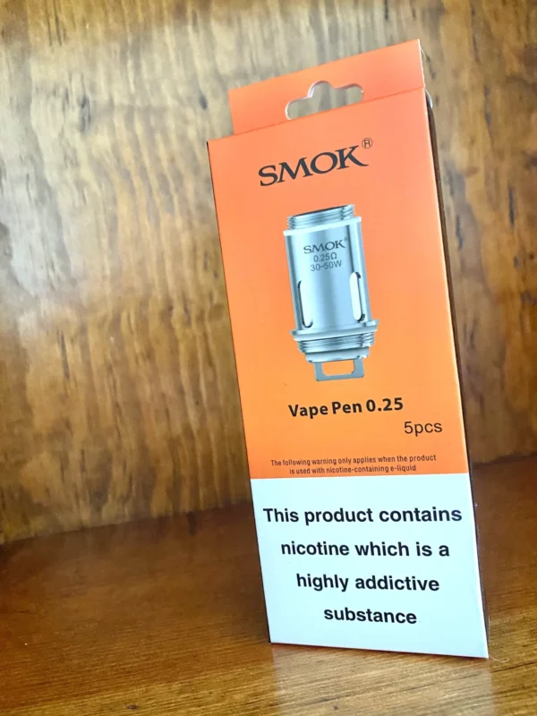 Smok vape pen 22 replacement coils 5 pack 0.25 ohms in orange box on wood background