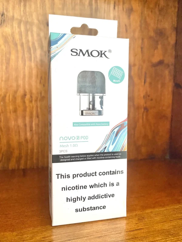 Smok-novo-2-replacement-pod Smok novo 2 replacement pod 3 pack 1.0 ohm on wood background
