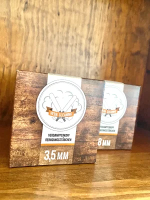 Hebb cleaning buds 3.5mm, 8mm on wood background