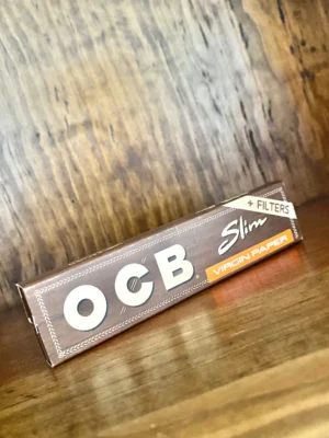 OCB slim virgin paper with filters on wood background